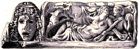Masque antique sur bas-relief.